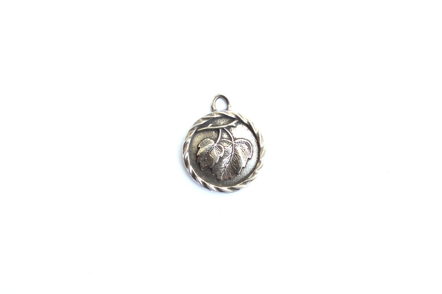 Hazel Leaves Charm in Britannium – Nature's Elegance with Twisted Detail