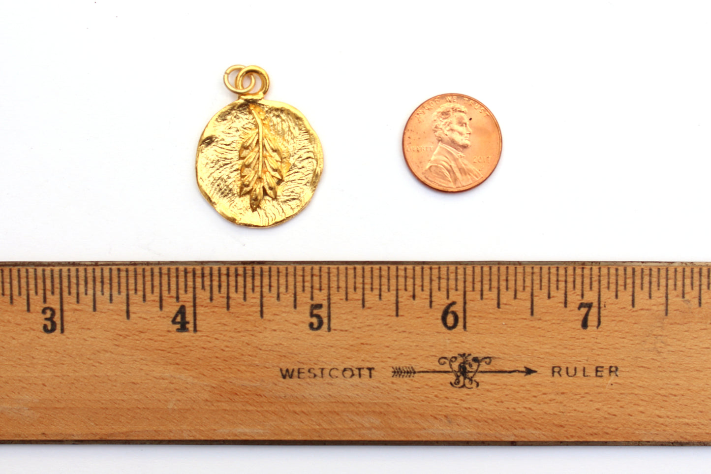 Ornamental Grass Pendant in Britannium – Nature's Whisper in Metal Form